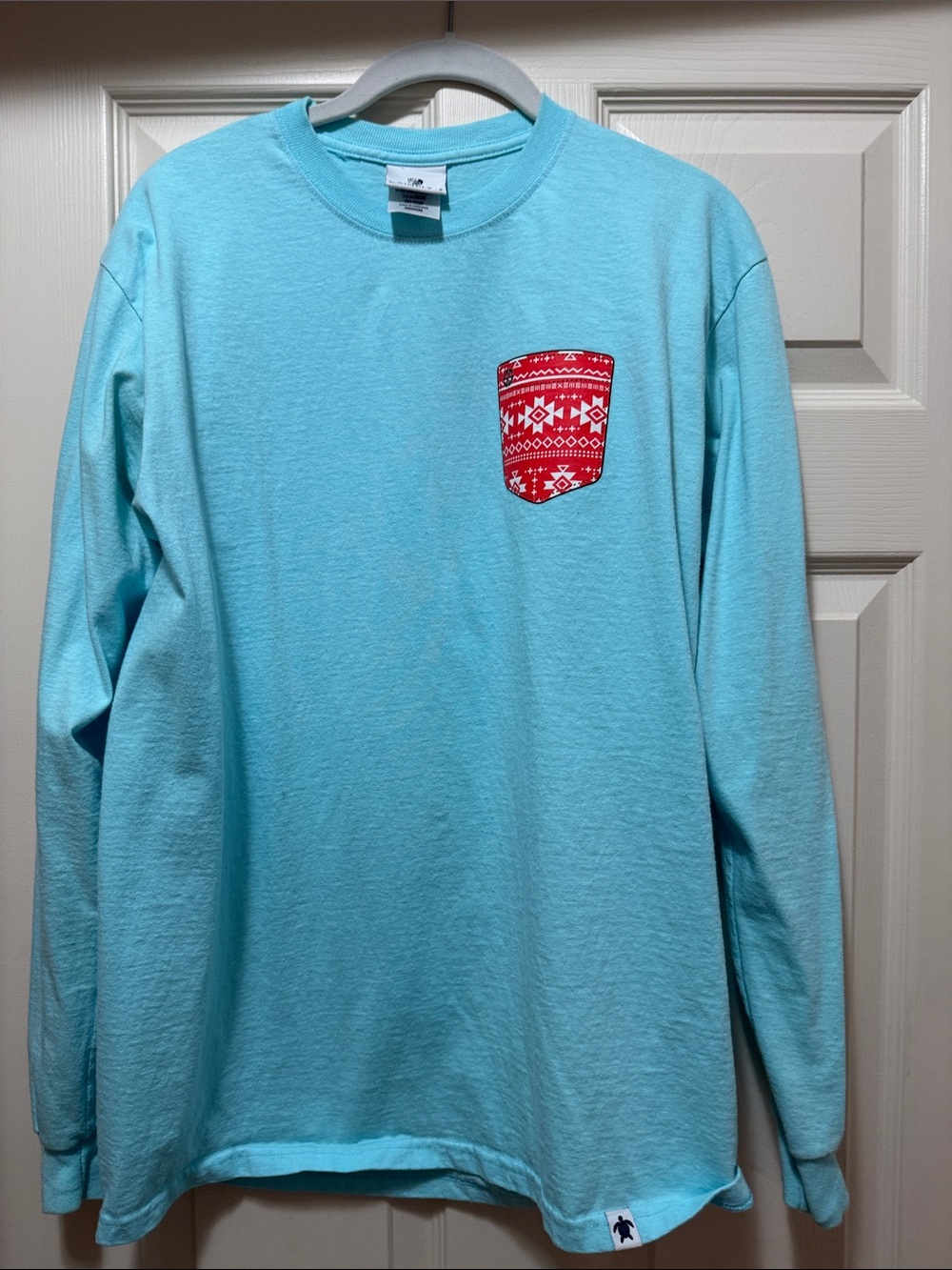 Simply Southern Aqua Long Sleeve Tee with Red Patterned Pocket and Elbow Accent